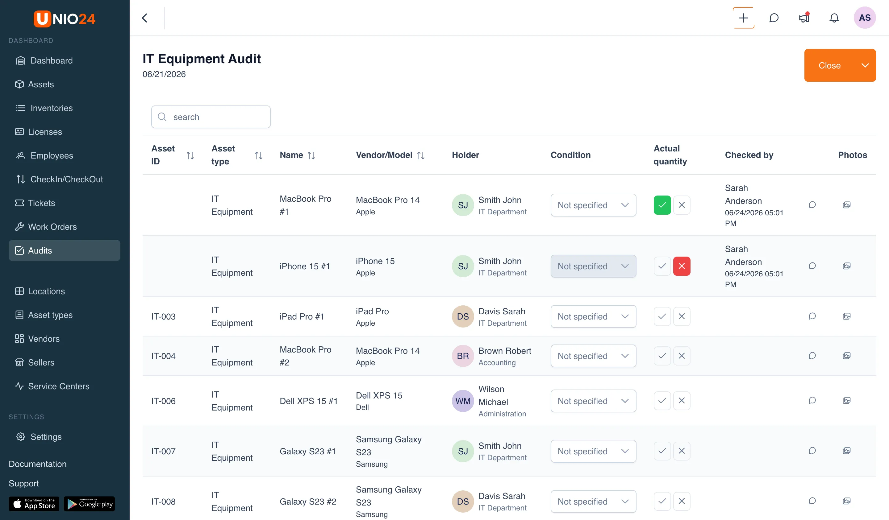 An open audit with a list of assets: one asset marked present (green checkmark button), another marked absent (red cross button), with the "Condition" column and the "Checked by" column visible