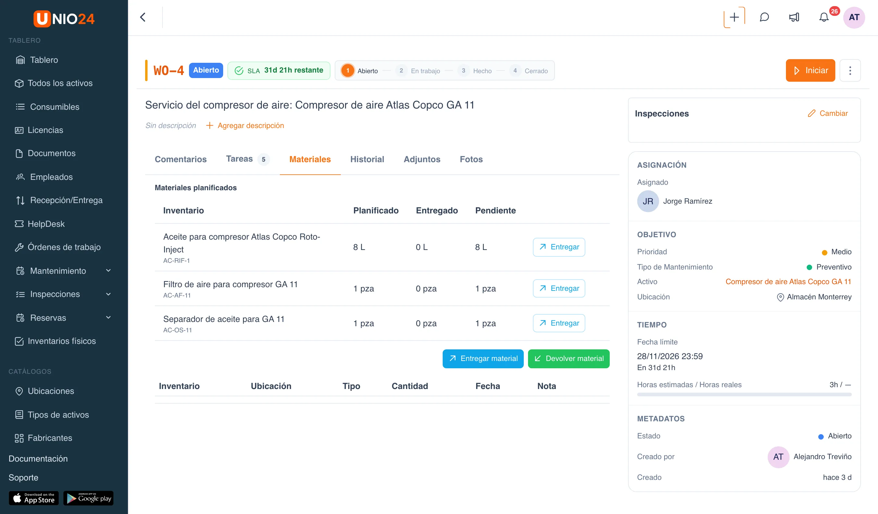 Pestaña «Materiales» de una orden de trabajo creada por el plan «Servicio del compresor de aire»: bloque «Materiales planificados» con la tabla «Inventario», «Planificado», «Entregado», «Pendiente» y el botón «Entregar» en cada fila; debajo, los botones «Entregar material» y «Devolver material»