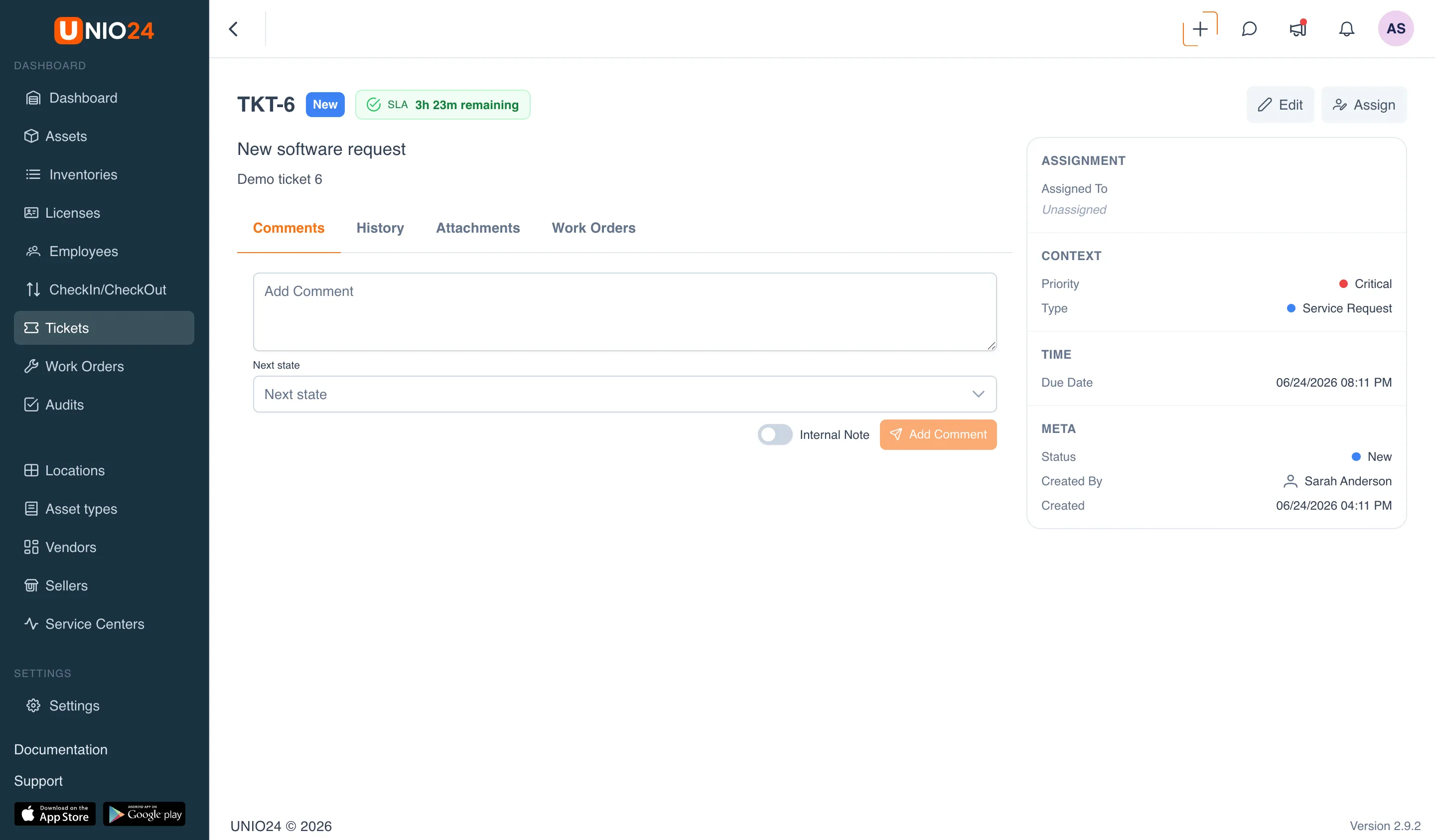 Ticket page: the header shows the ticket number, a status badge, and an SLA indicator with a countdown, plus the «Edit» and «Assign To» buttons; in the center, the «Comments», «History», «Attachments», and «Work Orders» tabs; on the right, a side panel with the «Assign», «Context» (priority, type), «Time», and «Meta» blocks